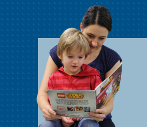A mom reads a book she got using the Books4Me service to her child.