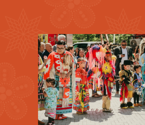 Indigenous Powwow dancers in full raglia.