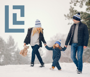 A family enjoying a winter walk.