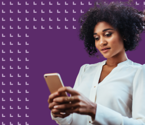 A woman adding her library card to her mobile device.