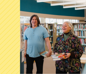 Two people enjoying each other's company at RPL's Sunrise Branch