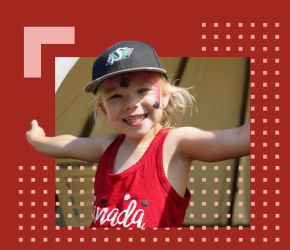 An image of a child in a red shirt