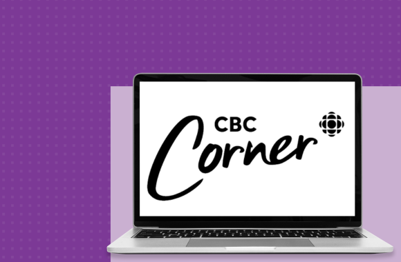 A laptop open to the CBC Corner website.