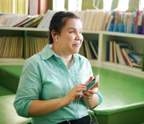 A person with a visual impairment explores accessible services from RPL on their mobile phone.
